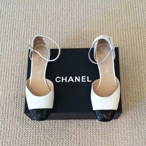 Authentic Chanel cap toe shoes with ankle straps.